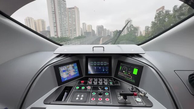 Electronic passenger information display inside a Line 17 Gold metro train showing upcoming stations in São Paulo, Brazil.