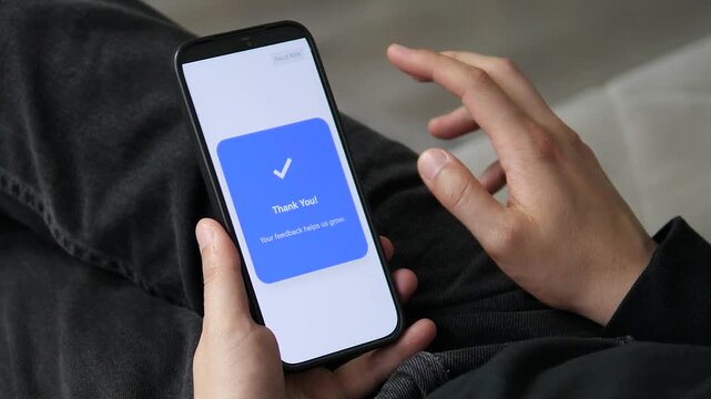 Smartphone showing a final state screen after a user completes a feedback form. The message confirms the successful submission. High demand for onboarding completion, user journey finalization, and