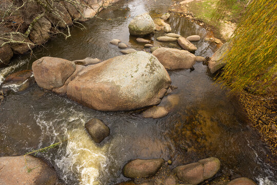 overhead view of boulders and stream