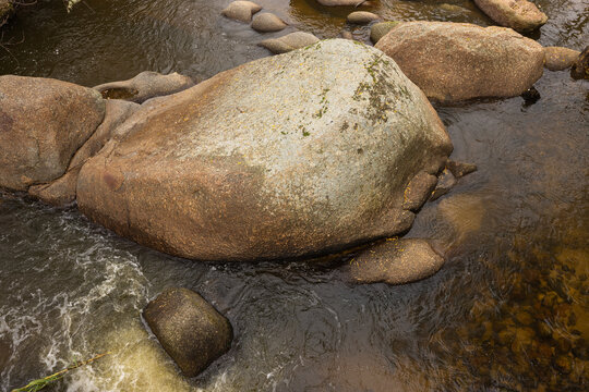 overhead view of boulders and stream