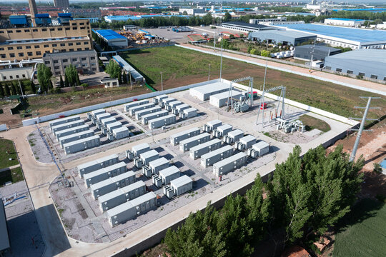 Aerial view of large-scale energy storage power station with equipment arrays and industrial infrastructure