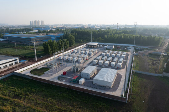 Aerial view of a large-scale energy storage power station campus with battery units and supporting facilities