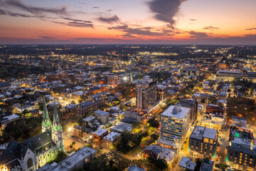 Fototapeta premium Aerial view of Savannah, Georgia. American city old historical architecture. USA panoramic cityscape at night