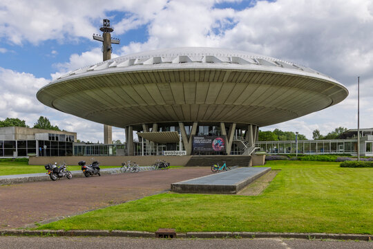 Eindhoven, Netherlands, 13 June 2026. The famous saucer-shaped retro-futuristic Evoluon building, originally built by Philips as a science museum, under a cloudy sky.