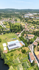 Fototapeta premium Allariz aerial view featuring solar energy and leisure facilities