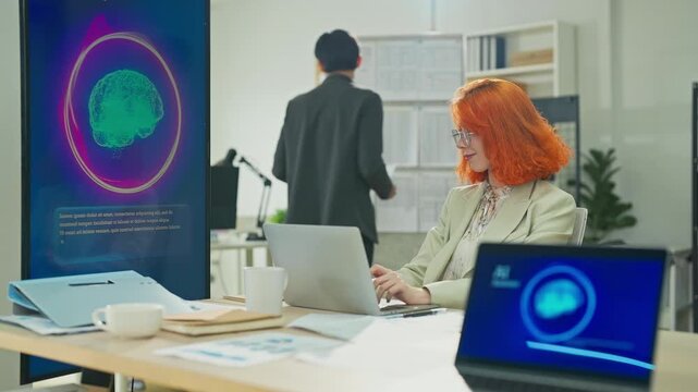 Caucasian female marketer using laptop and AI consultant on multiple screens to restructure business and marketing strategy in modern open office, digital transformation planning concept