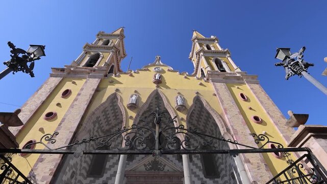 Low angle view of the historic facade of Mazatlan Cathedral in the old town historic center
