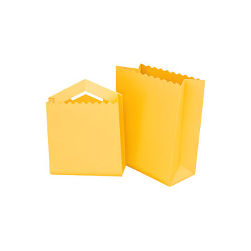 Two yellow paper bags isolated on white background for shopping or packaging purposes