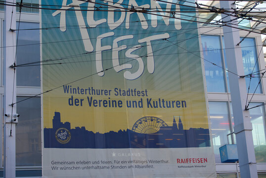 Banner of Albanifest feast at railway station of Swiss city of Winterthur on a sunny hot summer evening. Photo taken June 27th, 2026, Zurich Winterthur, Switzerland.