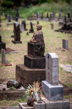 Japanese cemetery from the sugar plantation days in Hanapepe, Kauai, Hawaii. Many Japanese migrants came to Kauai to work in the sugar plantations and sugar mills.