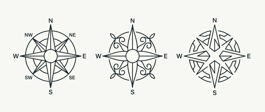 Three decorative compass rose designs on white background