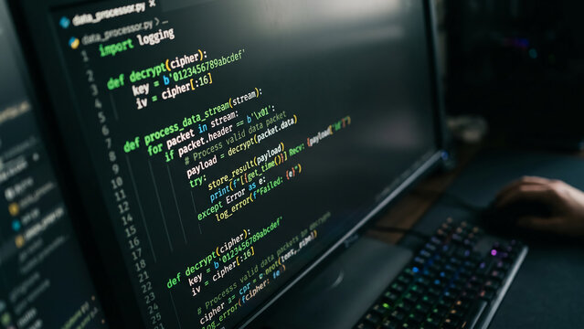 Close-up of computer screen with coding on display.