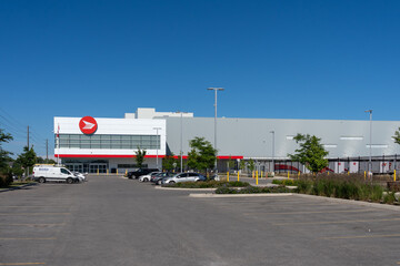 Fototapeta premium Toronto, Canada - June 27, 2026: Canada Post Albert Jackson Processing Centre on Tapscott Rd in Scarborough, Toronto, Ontario. The facility is Canada Post's largest parcel sorting center. 