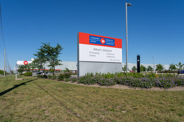 Fototapeta premium Toronto, Canada - June 27, 2026: Canada Post Albert Jackson Processing Centre on Tapscott Rd in Scarborough, Toronto, Ontario. The facility is Canada Post's largest parcel sorting center. 