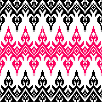 Seamless Thai ikat geometric pattern with pink and black flame motifs