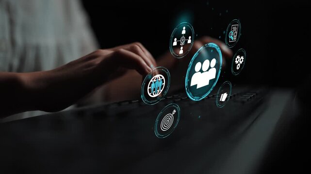 Hands on Keyboard with Futuristic Digital Icons Representing Social Media, Communication, Networking, and Data Technology Concepts for Stock Photography. Entropy.