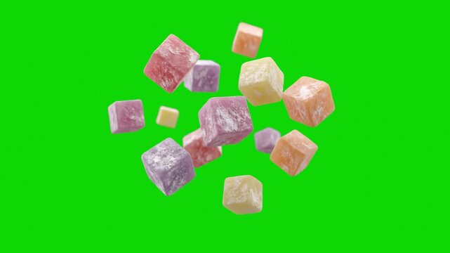 Bright pastel pink, purple, and cream-colored sugar cubes or candy blocks floating in mid-air, isolated on a solid green chroma key background. Perfect for confectionery commercials, dessert recipes, 