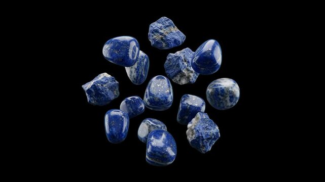 A collection of polished blue lapis lazuli gemstones, tumbled stones, or sapphire crystals floating against a solid black background. Great for crystal healing videos, jewelry promos, mystic concepts,