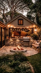 Obraz premium Cozy backyard oasis with stone fire pit, outdoor kitchen, and string lights for evening ambiance