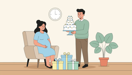 Fototapeta premium Caring husband presenting a beautiful three tier cake to his pregnant wife during a baby shower party at home.