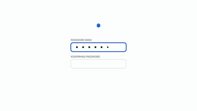 A person enters login credentials on a computer screen indoors.