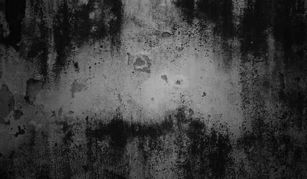 Dark gritty black and grey concrete wall with heavy weathered texture, concrete