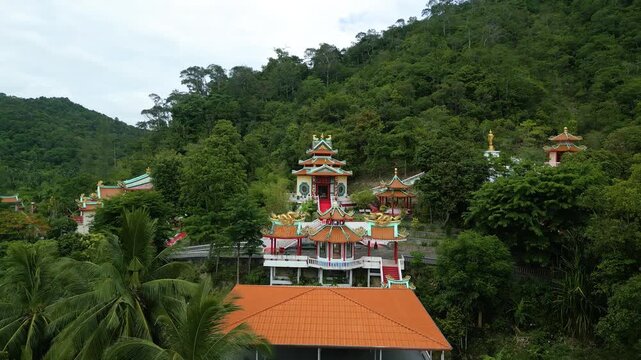 Drone Pull Back Reveal of Chao Mae Kuan Im Shrine in Chaloklum, Koh Phangan, Thailand