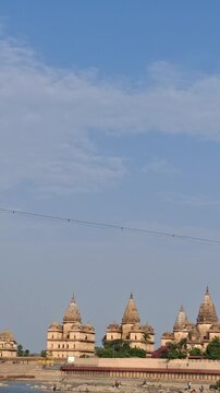 Scenic View of Historical Orchha Chhatris by the Riverbank