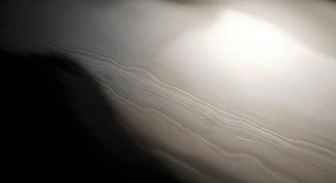Abstract flowing liquid surface featuring soft light reflections with smooth layered textures captured in a modern high resolution digital render