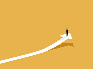 businessman stands on the arrow of growth, of progress. © Yoona