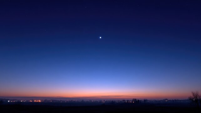 venus. The morning star visible above the horizon before sunrise in a dark blue sky. travel magazines, destination branding, designed for travel destination branding, used by web designers.