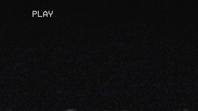 Old Damaged VHS Tape Playing with TV Noise and Static Effects. Video Cassette Recorder (VCR) with PLAY Text Animation. 4K Retro Vintage Background Overlay for Screen Mode.