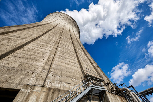 Nuclear Power Plant Cooling Tower and Industrial Chimney Releasing Steam Emissions