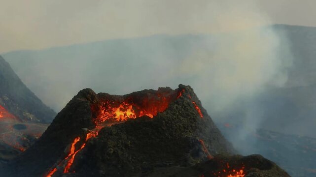 Fagradalsfjall Volcano Eruption in Iceland with Glowing Lava Flow and Dramatic Night Sky