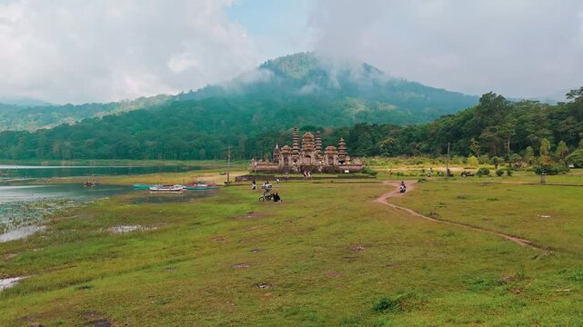 Sacred Heritage: Authentic Balinese Temple by Mountain Lake in Mist, 4K Landscape