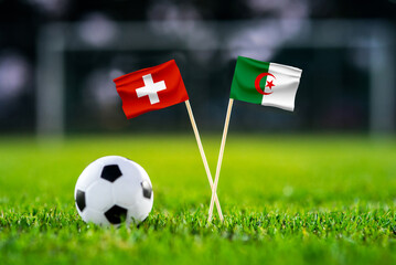 Plakat Switzerland vs Algeria, national flags before international football tournament Round of 32 match, football on green grass with goal in the background, Vancouver, British Columbia, Canada, July 2 2026
