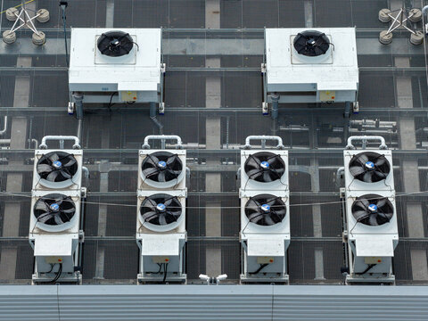 Aerial view of industrial HVAC cooling units installed on the roof of an AI data center in Warsaw, Masovian Voivodeship, Poland.