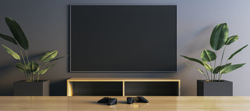 Blank tv screen mockup on modern wall above wooden console with plants and gaming controllers in clean contemporary interior design. 3D Rendering