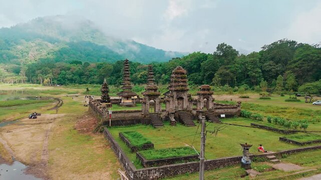 Sacred Heritage: Authentic Balinese Temple by Mountain Lake in Mist, 4K Landscape