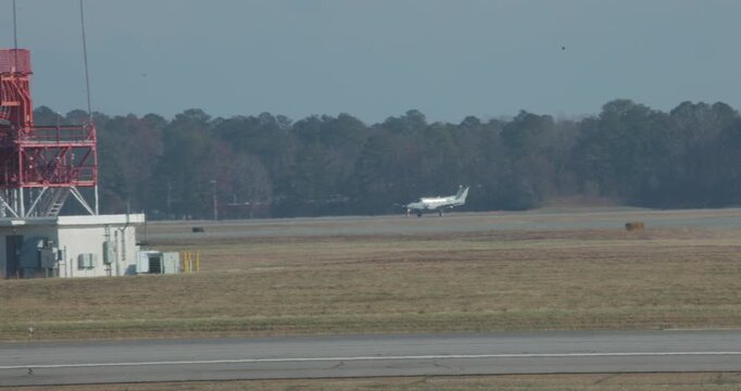 Small Airplane Landing at Richmond International Airport with Rotating Airport Radar