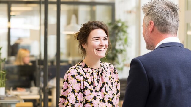 partners. Two colleagues sharing a positive moment together in a modern workplace. pitch deck slides, case study pages, designed for corporate presentation decks and stakeholder reports.