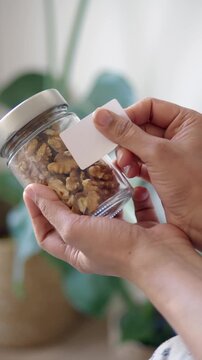 Making labels for jars to organize food items at home