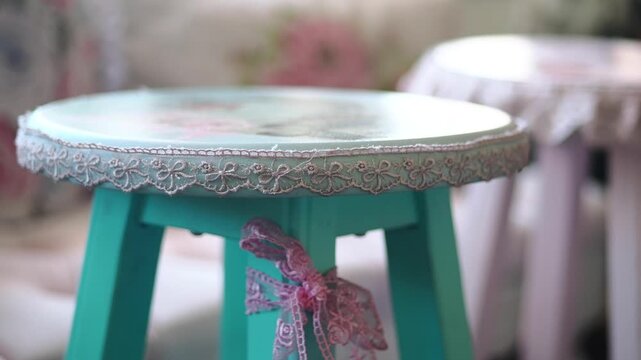 Colorful stools in a bright room with floral decorations