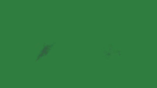 Clouds floating in the air two middle black image some smoke coming out of isolated on green screen background