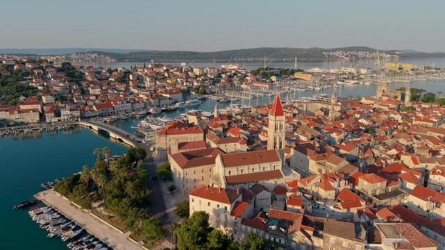 Croatia offers breathtaking views of Trogir, where historic buildings meet turquoise waters. Discover charming streets, vibrant boats, and picturesque landscapes that define this coastal gem.