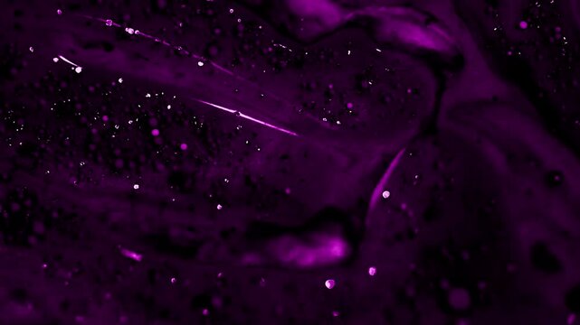Flowing purple sparkling background on dark 4k video