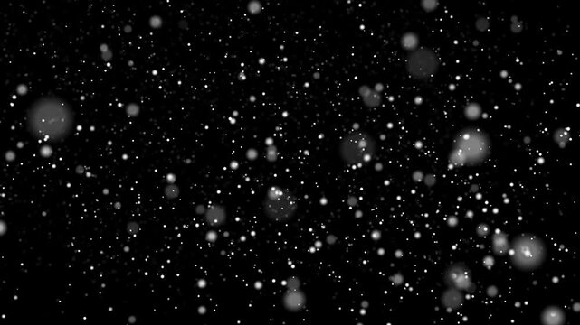 Seamless loop with windy snow particles moving across black background. Dynamic snow flow, realistic blizzard effect for winter projects. Infinite loop animation.
