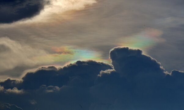 A colorful iridescent pileus cloud, taken after sunset in Thailand  