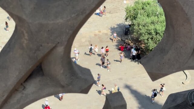 People and Tourists Gathering at Placita de la Seu Outside Barcelona Cathedral