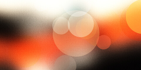 Abstract background featuring floating circles with orange and warm lighting effects on dark grainy textured base surface area. © rk